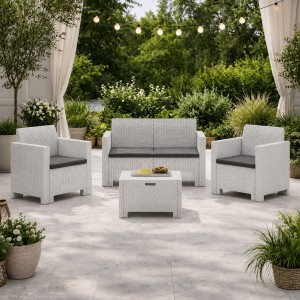Vista ambientata Set di divanetto poltroncine e tavolino per esterno realizzato in PP polipropilene effetto rattan resistente alle intemperie colore bianco Nebraska Made in Italy