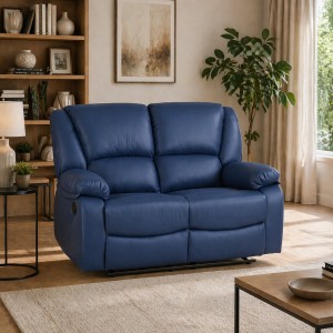 Vista ambientata di un divano 2 posti imbottito con funzione relax reclinabile e poggiapiedi in Similpelle Scamosciata Blu Calipso Totò Piccinni