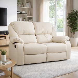 Vista ambientata di un divano 2 posti imbottito con funzione relax reclinabile e poggiapiedi in ecopelle Panna Calipso Totò Piccinni