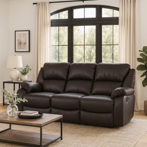 Vista ambientata  di un divano 3 posti imbottito con funzione relax reclinabile e poggiapiedi in ecopelle Marrone Calipso Totò Piccinni