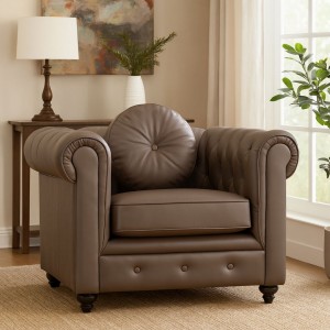 Vista ambientata Poltrona vintage trapuntata colore "Ecopelle Marrone" con piedini in legno modello Chester Totò Piccinni