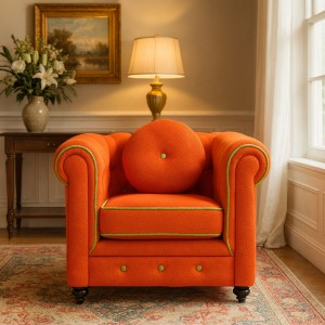 Vista ambientata Poltrona vintage trapuntata colore "3D Arancione" con piedini in legno modello Chester Totò Piccinni