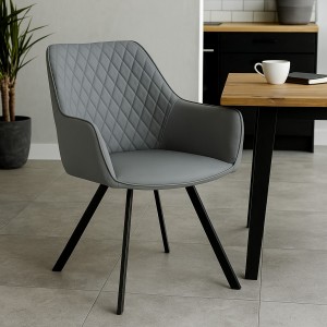 Vista ambientata Poltroncina in Similpelle imbottita colore Grigio con gambe in metallo modello Camelia Totò Piccinni