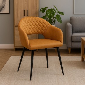 Vista ambientata Poltroncina in Similpelle imbottita colore Ruggine con gambe in metallo modello Dalia Totò Piccinni