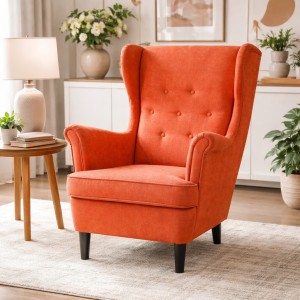 Vista ambientata Poltrona Arancione su sfondo bianco vista obliqua modello Lilibet Totò Piccinni - Design tipo Ikea Strandmon