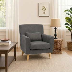 Vista ambientata Poltrona design moderno imbottita in Tessuto colore Cenere con piedi in legno modello Enea Totò Piccinni