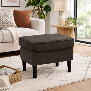 Vista ambientata pouf da salotto in tela marrone scuro con piedini alti di forma rettangolare - Lilibet totò piccinni
