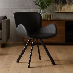 Vista ambientata Poltroncina in Similpelle imbottita colore Nero con gambe in metallo  modello Giove Totò Piccinni