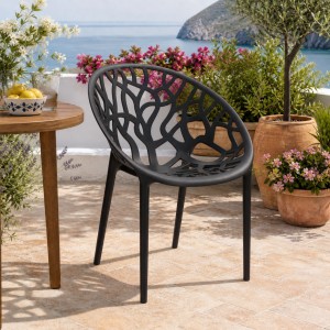 Vista ambientata Sedia poltroncina in polipropilene colore Nero moderna design impilabile modello Jungle Totò Piccinni