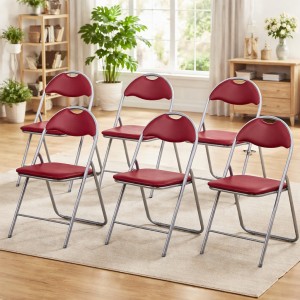 Vista ambientata Set di 6 sedie pieghevoli salvaspazio imbottite ecopelle colore Rosso Totò Piccinni