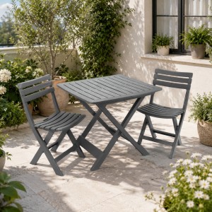 Vista ambientata Set da giardino in plastica con tavolo e sedie pieghevoli colore "antracite" modello Camping Totò Piccinni