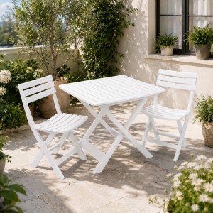 Vista ambientata Set da giardino in plastica con tavolo e sedie pieghevoli colore "bianco" modello Camping Totò Piccinni