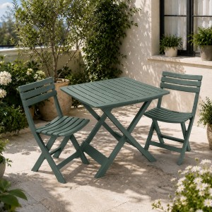 Vista ambientata Set da giardino in plastica con tavolo e sedie pieghevoli colore "verde" modello Camping Totò Piccinni