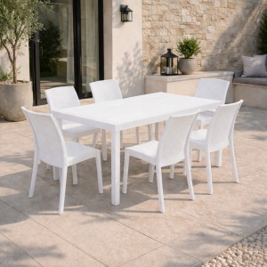 Vista ambientata set pranzo tavolo huston 150x90 con 6 sedie senza braccioli virginia in polipropilene colore bianco