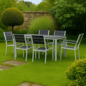 Vista ambientata set pranzo tavolo messico 158x78 con 6 sedie con braccioli messico struttura in metallo e polietilene effetto legno colore grafite