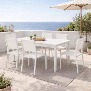 Vista ambientata Set pranzo da esterno con tavolo allungabile in alluminio 160/240 colore Bianco con 6 sedie senza braccioli modello Linosa Totò Piccinni