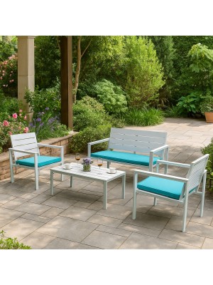 Vista ambientata set da giardino colore Bianco divano 2 poltrone e tavolino struttura in metallo e polietilene modello Haiti Totò Piccinni