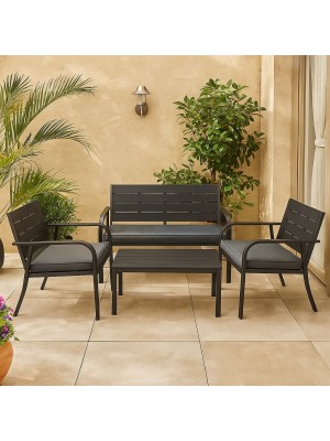 Vista ambientata set da giardino colore Nero divano, 2 poltrone e tavolino struttura in metallo e polietilene modello Cuba Totò Piccinni