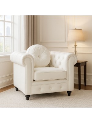 Vista ambientata Poltrona vintage trapuntata colore "Ecopelle Panna" con piedini in legno modello Chester Totò Piccinni