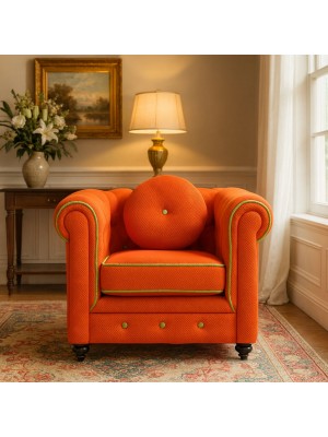 Vista ambientata Poltrona vintage trapuntata colore "3D Arancione" con piedini in legno modello Chester Totò Piccinni