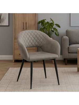 Vista ambientata Poltroncina in Similpelle imbottita colore Grigio con gambe in metallo modello Dalia Totò Piccinni