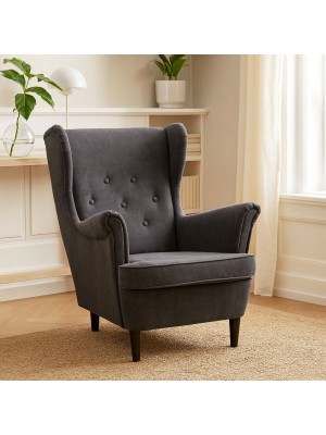 Vista ambientata Poltrona Grigio Scuro su sfondo bianco vista obliqua modello Lilibet Totò Piccinni - Design tipo Ikea Strandmon