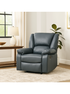 Vista ambientata di una robusta poltrona imbottita relax con schienale e poggiapiedi reclinabili in similpelle scamosciata antracite modello Calipso Totò Piccinni