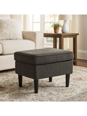 Vista ambientata pouf da salotto in tela marrone scuro con piedini alti di forma rettangolare - Lilibet totò piccinni