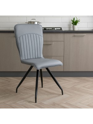 Vista ambientata Sedia in Similpelle colore Grigio con gambe in metallo modello Minerva Totò Piccinni