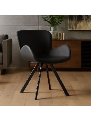 Vista ambientata Poltroncina in Similpelle imbottita colore Nero con gambe in metallo  modello Giove Totò Piccinni