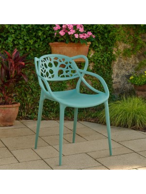 Vista ambientata Sedia Design in Polipropilene Verde Salvia - Totò Piccinni Infinity Timber vista obliqua