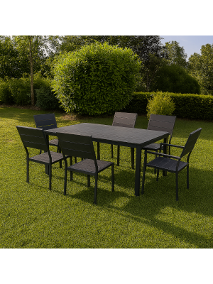 Vista ambientata set pranzo tavolo messico 158x78 con 4 sedie senza braccioli, 2 con braccioli messico con struttura in metallo e polietilene effetto legno 