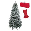 albero di natale innevato realistico con neve artificiale floccata, immagine su sfondo bianco, con Albero di Natale Berna Totò Piccinni con borsone porta albero rosso e cuscino plaid rosso.