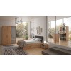 Vista ambientata Armadio moderno in legno colore "Rovere Artisan/Grigio Laccato" con 3 ante e 4 cassetti modello Aura Totò Piccinni