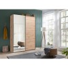 Vista ambientata Armadio design in legno struttura Rovere Artisan con 2 ante scorrevoli, 1 Rovere Artisan e 1 a specchio modello Sliding Totò Piccinni