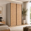Vista ambientata con ante chiuse Armadio moderno in legno struttura Cashmere con 2 ante rovere artisan modello Sliding Totò Piccinni