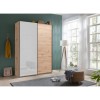 Vista ambientata Armadio design in legno struttura Rovere Artisan con 2 ante scorrevoli, 1 Grigio Chiaro Lucido e 1 Rovere Artisan  modello Sliding Totò Piccinni