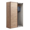 Vista diagonale con anta aperta Armadio ante scorrevoli in legno struttura Rovere Artisan con 2 ante scorrevoli Rovere Artisan modello Sliding Totò Piccinni