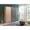 Vista ambientata Armadio design in legno struttura Rovere Artisan con 2 ante scorrevoli, 1 Cemento e 1 Rovere Artisan  modello Sliding Totò Piccinni