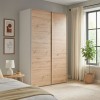 Vista ambientata Armadio in legno struttura Bianca con due ante scorrevoli Rovere Artisan modello Sliding Totò Piccinni