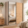 Vista ambientata con ante chiuse Armadio moderno in legno struttura Cashmere con 2 ante scorrevoli rovere artisan e specchio modello Sliding Totò Piccinni