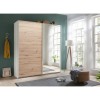 Vista ambientata Armadio guardaroba design in legno struttura Bianco con due ante scorrevoli, 1 Rovere Artisan e 1 a Specchio modello Sliding Totò Piccinni