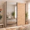 Vista ambientata con ante chiuse Armadio moderno in legno struttura Cashmere con 2 ante scorrevoli rovere artisan e specchio modello Sliding Totò Piccinni