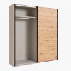 Vista diagonale con anta aperta Armadio in legno struttura Cashmere con 2 ante scorrevoli rovere artisan e specchio modello Sliding Totò Piccinni