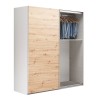 Vista diagonale con anta aperta Armadio moderno in legno struttura Bianco con due ante scorrevoli, Rovere Artisan modello Sliding Totò Piccinni