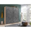 Vista ambientata Armadio guardaroba design in legno struttura Rovere Artisan con due ante scorrevoli, Grigio Cemento modello Sliding Totò Piccinni