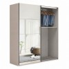 Vista diagonale con anta aperta Armadio ante scorrevoli in legno struttura Cashmere con 2 ante scorrevoli a specchio modello Sliding Totò Piccinni