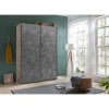 Vista ambientata Armadio design in legno struttura Noce Brera con 2 ante scorrevoli Cemento modello Sliding Totò Piccinni