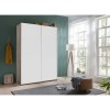 Vista ambientata Armadio design in legno struttura Noce Brera con 2 ante scorrevoli Bianco Opaco modello Sliding Totò Piccinni