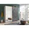 Vista ambientata Armadio design in legno struttura Noce Brera con 2 ante scorrevoli, 1 Cemento e 1 a Specchio modello Sliding Totò Piccinni